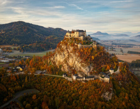 View of Hochosterwitz Castle, one of Austria most impressive medieval castles dating back to the 9th century and one of the landmarks of Carinthia. Autumn morning in Alps, castle on the hill.